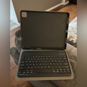 iPad case with Bluetooth keyboard. Works great, very few cosmetic blemishes.